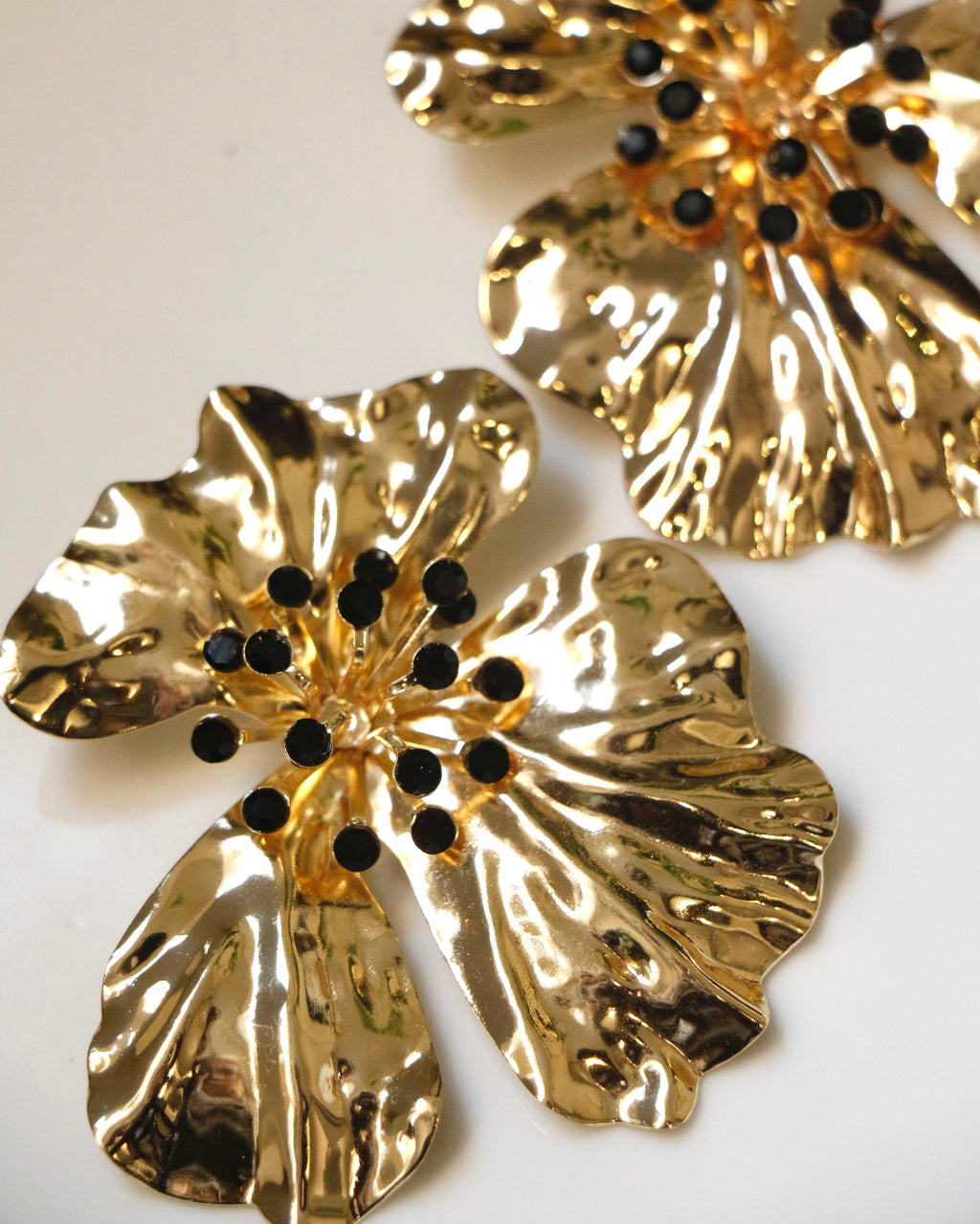 Caravanas flor dorada strass