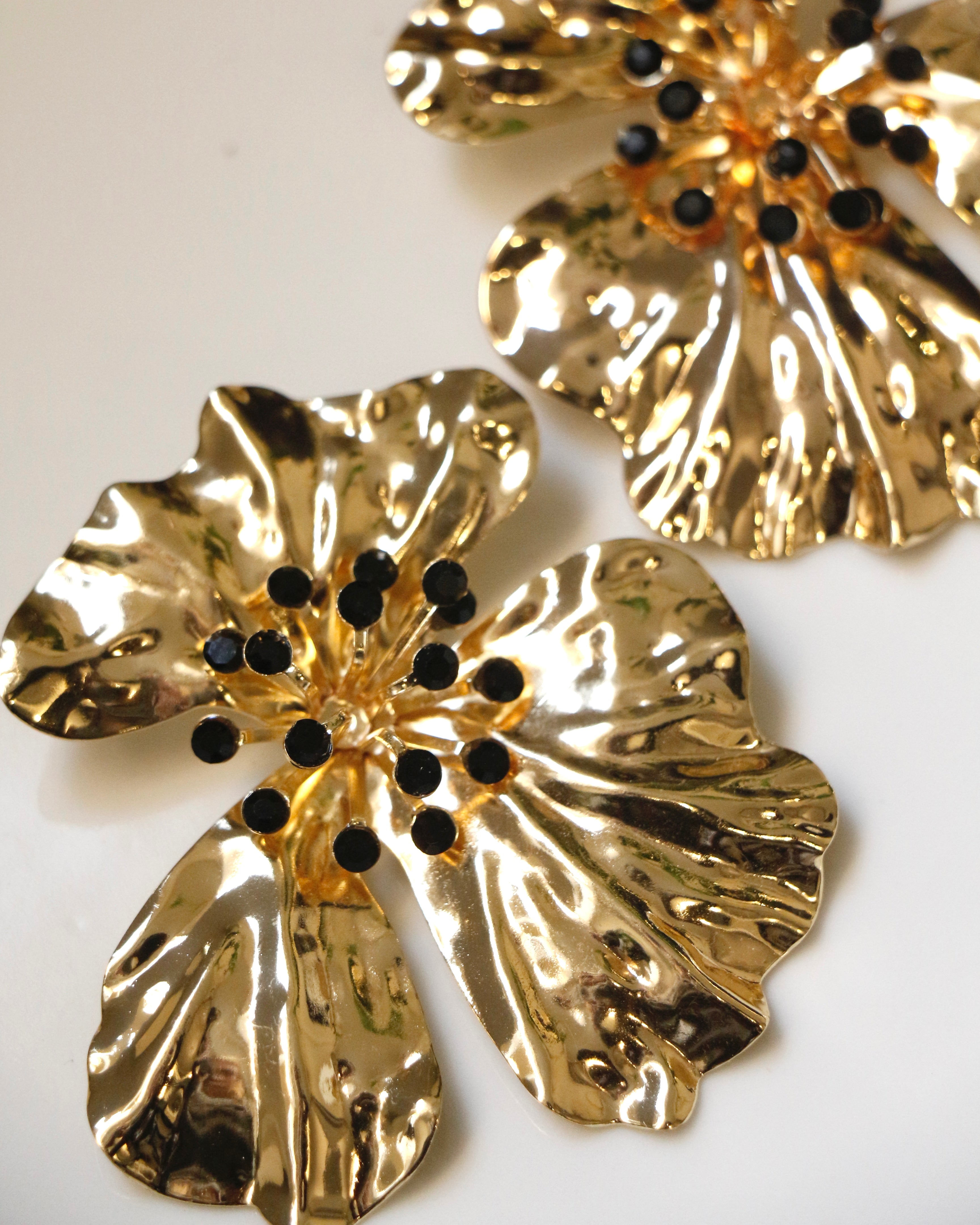Caravanas flor dorada strass