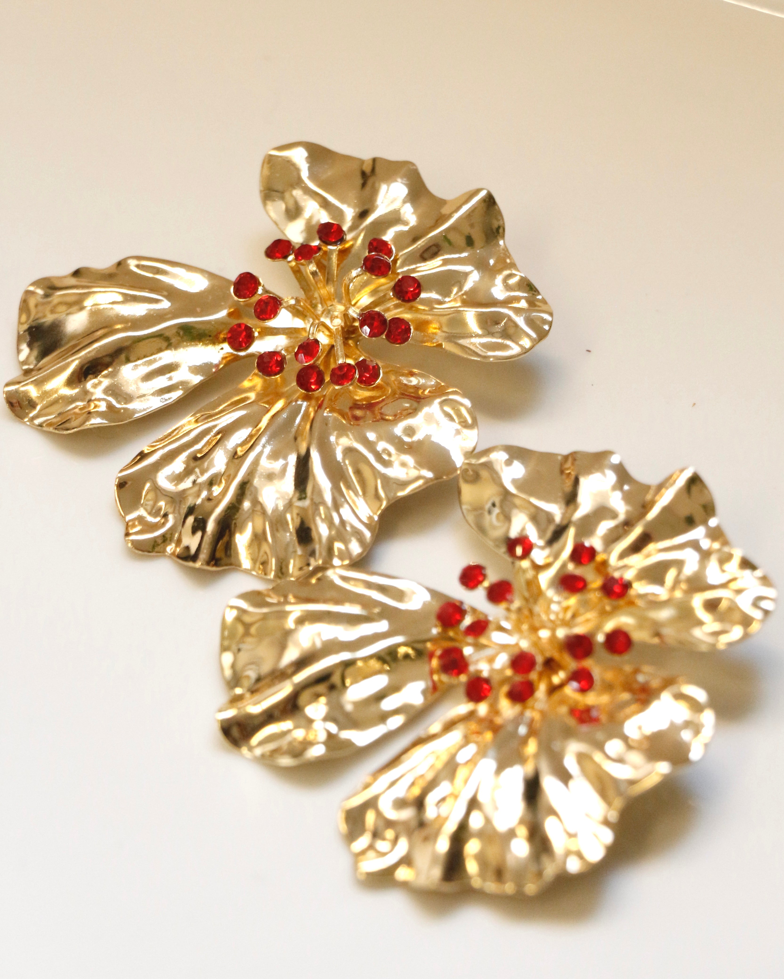 Caravanas flor dorada strass