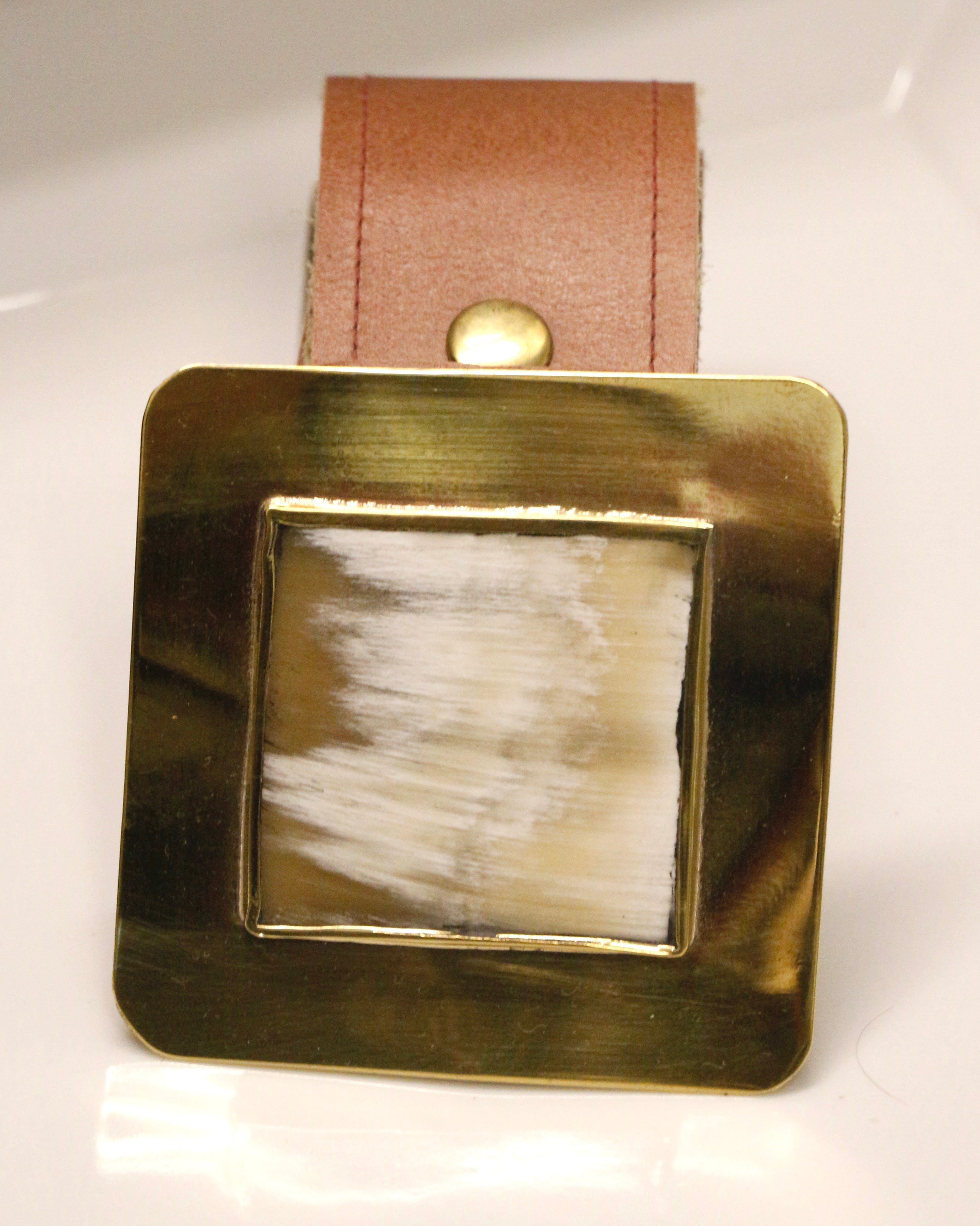Cinto en guampa y bronce